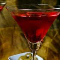 Serveersuggestie Feestelijke cranberry cocktail - Lovemyfood.nl